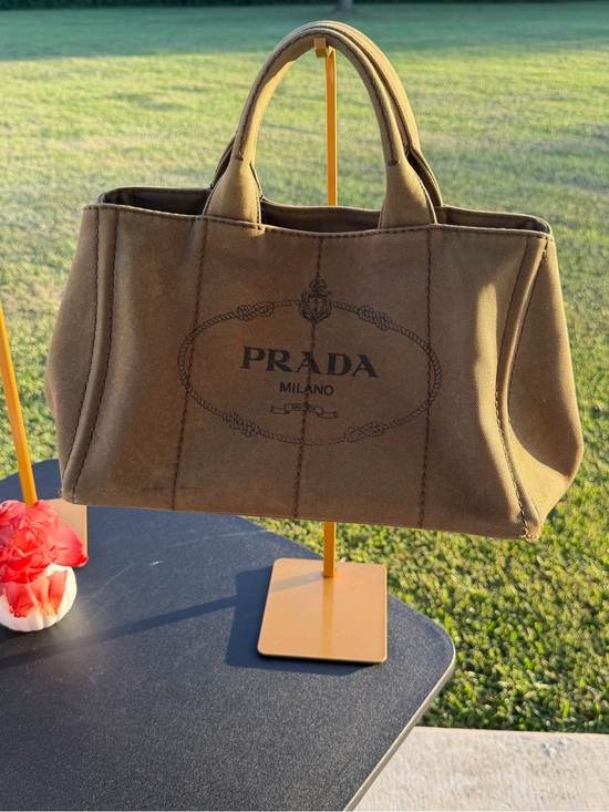 Prada Handbags - Prada taupe canvas tote with gold plaque
